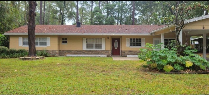 Spacious 3-bedroom, 2-bath home with plenty of storage, thoughtful upgrades, and a convenient location near shopping, entertainment, and I-75. The home features ceramic tile flooring in the living and dining areas, hardwood flooring in the hallway, and an upgraded kitchen with stainless steel appliances, granite countertops, custom backsplash and upgraded cabinetry. There is also a dedicated wine cellar/bar area. 

Just off the kitchen is a flex space that could used as an office, den, or potential 4th bedroom. The primary bathroom features a custom tiled shower and single-sink vanity, while the hall bathroom offers a shower/tub combo with a single-sink vanity.

Enjoy outdoor living with a large concrete patio, play yard, 2-car covered parking in front of the home, plus a separate 2-car carport perfect for boat or RV parking.

Whether you’re looking to add a great investment property to your portfolio or searching for a place to make lasting memories with your family for years to come, this home offers the perfect opportunity. Schedule your private showing today!