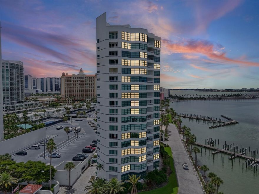 A rare opportunity to own one of Sarasota’s most coveted addresses. This highly desirable corner
residence on the 10th floor of Condo on the Bay offers uninterrupted, forever views from every room.
From sunrise over Sarasota Bay to fiery Gulf sunsets, your panorama will never be blocked thanks to
the building’s premier bayfront position. This fully reimagined residence blends modern elegance with
timeless design. Twenty four inch porcelain tile sweeps throughout, setting the stage for a chef’s kitchen that is
as striking as it is functional featuring custom cabinetry with iron-framed glass front display cases,
sleek quartz countertops, and a full suite of Wolf and Sub-Zero appliances. Hurricane-rated sliding
glass doors frame the water and open to two private balconies for alfresco dining against a stunning
backdrop. The floor plan offers true privacy, with the primary suite showcasing wraparound bay views,
a spa-inspired bath, and generous closets. The guest suite has been redesigned, and  features a luxurious en suite bath and
walk-in closet, creating a second private retreat. Every fixture, finish, and surface has been
hand-selected for both beauty and longevity, delivering a residence that is as functional as it is
breathtaking. Set within one of Sarasota’s most prestigious gated communities, enjoy a resort-style
pool, fitness center, tennis & pickleball courts, boat slips, concierge services, and a beautifully
appointed events room within the tower, complete with a full kitchen for hosting private gatherings.
Added conveniences include garage parking and on-site electric car charging stations, ensuring
modern comfort meets sophisticated living. All of this, mere steps from the cultural heartbeat of
downtown Sarasota, fine dining, galleries, and the world’s finest beaches.