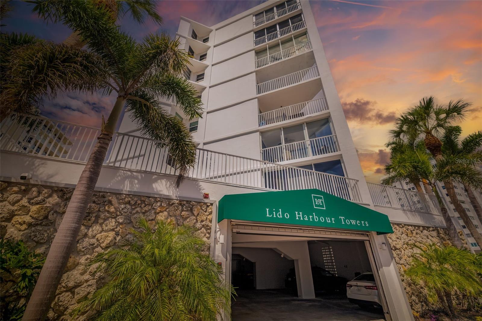 A striking horizon awaits you at this quaint, two bed/two bath home on the second floor of Lido Harbour Towers. Find yourself immersed in the best of Florida gulf coast living. To your west is endless, sparkling waters gently lapping onto powdery white sand beaches. To your east is the incomparable Ted Sperling Nature Preserve where wildlife is the entertainment as you kayak through mangrove forests or walk the trails. To your south is South Lido Key Beach Park, the breathtaking southern tip of Lido Key. And to your north is the upscale, bustling St Armand’s circle brimming with eclectic dining, high end shopping and vibrant culture! Live your quintessential Florida lifestyle in this charming, clean and coastal home. The bright, white kitchen offers loads of storage, ample counterspace and a walk-in pantry! The open concept living area is a comfortable space while the lanai is an amazing perch to watch palm trees gently swaying and framing your view of the water. Open your sliders, which are impact rated for peace of mind, to catch a cool salty breeze with your morning coffee or to watch the sky transform to mesmerizing colors with your evening spirits. Retire to your primary suite to rest and recharge for your next day of Florida adventures. The additional bedroom will accommodate your beach seeking guests, who will also enjoy the convenience of their own full bath. Enjoy community amenities including the beach front pool, community clubhouse with a full kitchen and outdoor grill. Your island life is stress free with secured entry, assigned covered parking, and a convenient storage locker just outside your front door. Whether you are seeking lazy days at the beach or vibrant, entertainment filled evenings at St Armands circle or downtown Sarasota, why not have it all? This unique opportunity is the perfect location for the seasonal gulf coast dweller or the full time resident!
