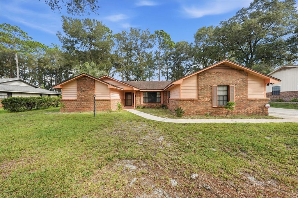 Photo of 769 Torchwood Drive, Deland, FL 32724 (MLS # V4951337)