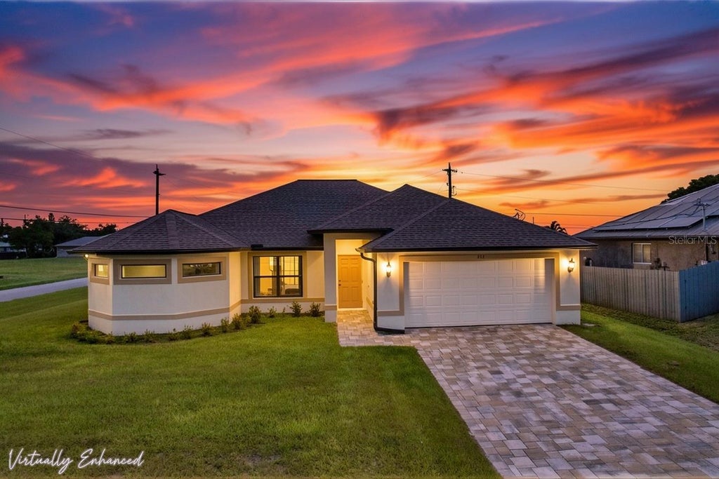 Photo of 217 NE 20th Terrace, Cape Coral, FL 33909 (MLS # C7530023)