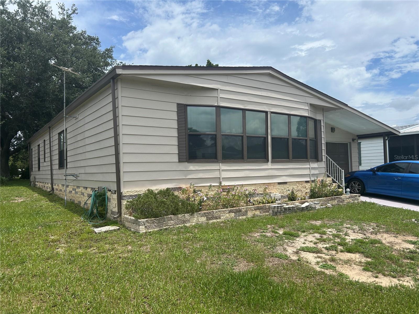 DON'T MISS THIS HIDDEN JEWEL OF A COMMUNITY. LOCATED IN THE HEART OF CENTRAL FLORIDA. ACTIVE 55+ COMMUNITY WITH PICKLEBALL COURTS, BACCI, 9 HOLE GOLF COURSE AND MORE! 2 CLUBHOUSES WITH POOLS. 1GOLF CART ARE OKAY TO DRIVE IN THE COMMUNITY. 0 MINUTES TO DISNEY. SHOPPING AND RESTAURANTS VERY CLOSE BY.
THIS WONDERFUL 1320 SQ FT 2 BEDROOM 2 BATH HOME FEATURES AN OPEN AND AIRY LAYOUT, KITCHEN ,DINING ROOM AND LIVING ROOM WITH A WALK THROUGH TO A HUGE GREAT ROOM. ROOF IS 8 YEARS OLD. OVERSIZED GARAGE THAT CAN FIT 2 CARS BACK TO BACK AND STILL ROOM FOR A LAUNDRY ROOM AND STORAGE AREA.