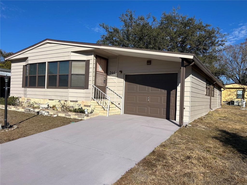 Photo of 244 Menlo Park Avenue, Davenport, FL 33897 (MLS # O6324363)