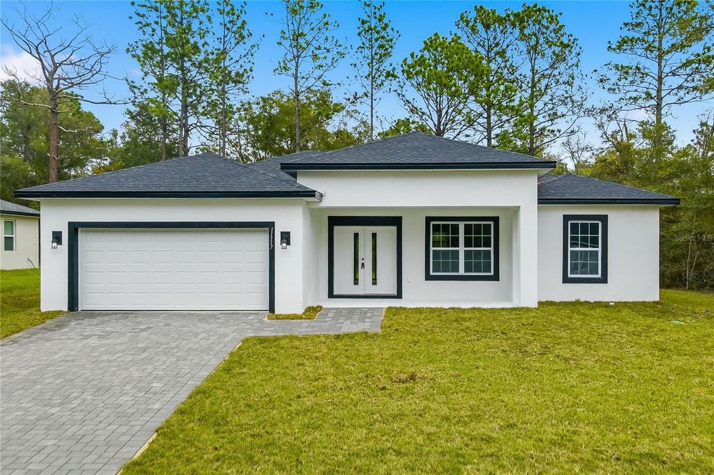 Photo of 11317 N Bunny Terrace, Citrus Springs, FL 34434 (MLS # O6363593)