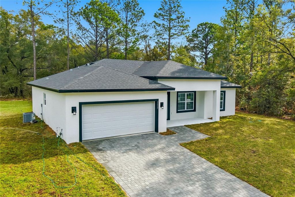 Photo of 11317 N Bunny Terrace, Citrus Springs, FL 34434 (MLS # O6363593)