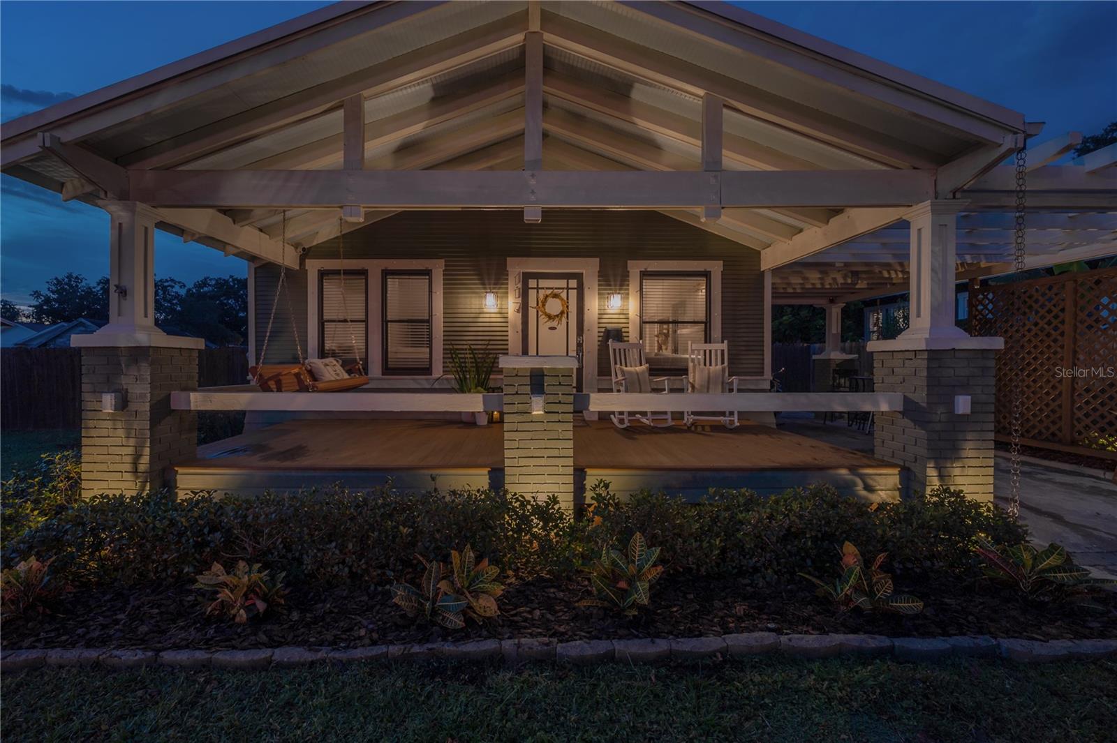 Welcome to the Mid Century Modern Bungalow: A rare blend of craftsman charm + mid-century soul, on one of the biggest lots in the neighborhood. Set on a rare 75x122 lot-and-a-half in the heart of Old Seminole Heights, this custom-renovated 1925 Craftsman Bungalow is NOT your average historic home. Thoughtfully updated and full of charm and personality, it combines the warmth of a classic bungalow with clean mid-century design vibes—and a dream of a backyard. From the moment you pull up, you’ll notice the difference. A porte-cochère with trellis detail, lush landscaping, and paver driveway give the home that show-stopping curb appeal that homebuyers look for. Mature oaks and brick streets complete the picture-perfect setting in one of Tampa’s most desirable neighborhoods. Inside, sunlight pours through restored sash windows, highlighting original wood floors and a cozy fireplace. The open living and dining spaces flow into a striking custom kitchen featuring walnut cabinetry, concrete countertops, floating shelves, new zellige backsplash, and stainless appliances—including a brand new dishwasher, natural gas cooktop, and built-in wall oven and microwave. A bright bay window and built-in spice storage add extra charm and light to the space. The layout is flexible, with a front bedroom (currently styled with custom barn doors as a second living space w/ sleeper sofa to easily convert to guest room) perfect for guests, an office, playroom, or additional living space. Tucked in the back, the vaulted-ceiling primary suite is separate from the rest of the house, complete with a unique transom window and spa-like ensuite bath with subway tile and a walk-in shower. The guest bath feels like a piece of art—featuring a skylit shower, cast iron soaker tub, penny tile, and a custom floating vanity with epoxy wood ribbon detail. And a HUGE bonus? The backyard. The side yard has been cleared of trees and prepped for a future pool or guesthouse, and the owners already have plans, renderings and quotes for a resort-style pool. You’ll love the already-finished 800sqft paver patio with a built-in bar (gas line, fridge, and kegerator-ready), a natural gas fire pit, and lush tropical landscaping. Automated lighting, a rain chain gutter system, and fence complete the low-maintenance setup. There's even a large storage shed and a brand new stacked smart Samsung washer/dryer in the revamped laundry room/mudroom. Major system updates include: 2020 HVAC (recently serviced), 2019 tankless gas water heater, 2019 new water line, updated electrical & plumbing, 2012 durable metal roof, functional original windows with new screens + custom hurricane fabric shutters. Enjoy living around the corner from local favorites like The Salty Donut, Trip’s Diner, Ology Brewing, Gulf Coast Sourdough Sandwich Shop, Rooster & the Till, The C House, and The Front Porch—or spend weekends at Epps Park, Henry & Ola Dog Park, or on the Hillsborough River just down the street (with boat launch 5 minutes away). Just minutes to downtown Tampa, the airport, Armature Works, the Tampa Riverwalk, Ybor City and the new GasWorx development, the Channel District and Water street, and South Tampa, this home offers the perfect mix of character, location, and long-term potential.
Bonus offer: Buyers using the seller’s preferred lender may qualify for a closing cost or rate buy down incentive (inquire with agent for more details). Make the Mid Century Modern Bungalow your new Seminole Heights home!