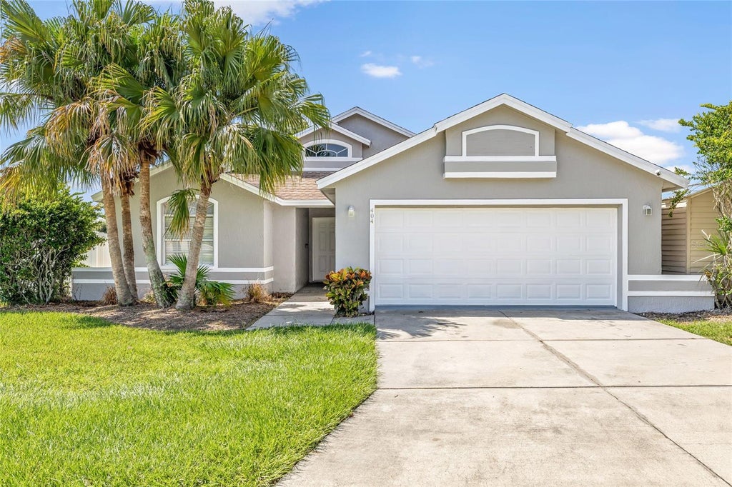 Photo of 404 Emerald Cove Loop, Lakeland, FL 33813 (MLS # L4964202)