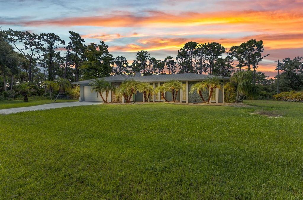 Photo of 12031 Hunter Avenue, Port Charlotte, FL 33953 (MLS # C7513545)