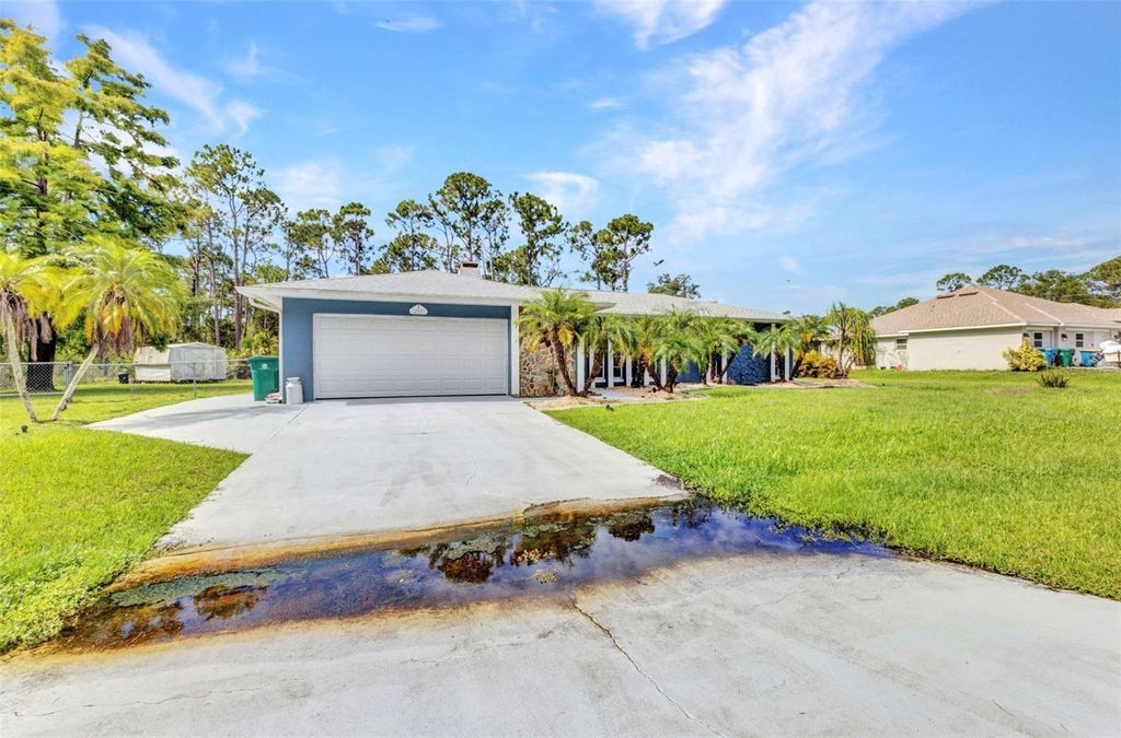 Photo of 12031 Hunter Avenue, Port Charlotte, FL 33953 (MLS # C7513545)