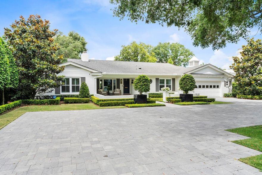 Welcome to your dream home on sought-after Park Avenue! This stunning one-story, three-bedroom, three-bath residence is situated on an expansive 18,000 square feet (0.41-acre) lot and has been meticulously renovated to offer everything a discerning buyer could desire. Wonderful curb appeal with its stately front yard and large circular driveway. Step inside to discover gorgeous wood floors that flow throughout the home, a beautiful formal living room with a gas fireplace, a spacious family room and a bonus room (currently used as a playroom) boasting stunning wood vaulted ceilings and a wall of Windsor French doors that open to a honed marble patio and pool deck. The kitchen, renovated by S & W Kitchens, is a chef’s delight with a breathtaking marble waterfall island, a Café appliance package, including a stylish hood vent, and a large walk-in pantry. The primary suite is a true retreat, featuring two closets (one walk-in and one built-in) and an ensuite bath with a large glass shower and dual sinks. Step outside to a bamboo-lined fenced backyard that is an entertainer’s paradise. The zero grout-lined marble patio and sparkling pool with a sun shelf create a serene and luxurious outdoor space. Located on a picturesque brick street in downtown Winter Park, this home offers quintessential Winter Park living. Enjoy a leisurely stroll to shopping and dining on Park Avenue, the historic Winter Park 9 Golf Course, the Farmer’s Market, numerous holiday events and festivities in Central Park, and so much more. Don’t miss the opportunity to own this breathtaking home in one of Winter Park’s most coveted locations on Park Avenue.