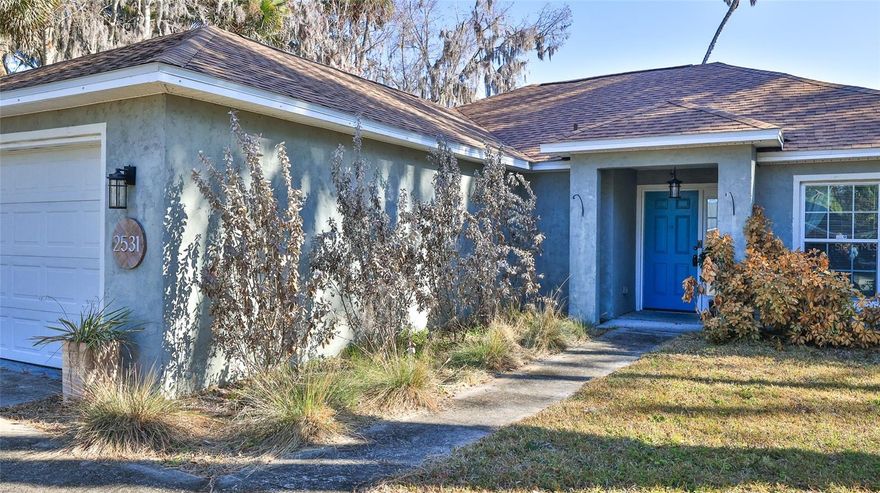 Well-maintained 3-bedroom, 2-bath concrete block home offering an open-concept layout with a desirable split-bedroom floor plan. An inviting foyer with updated tile leads into the spacious living and dining area with vaulted ceilings and great natural light.

The kitchen features stainless steel appliances, a pantry, breakfast bar, and updated tile flooring. An interior laundry room is conveniently located just off the kitchen. The primary bedroom is light and comfortable, with a remodeled bath that includes dual vanities and a walk-in closet. Two additional bedrooms and a second full bath are situated on the opposite side of the home for added privacy.

Sliding doors open to a screened porch and enclosed bonus room—ideal for a hobby space, gym, or home office—overlooking the large, fenced backyard. The home sits on an oversized 120x125 corner lot with mature trees.

Conveniently located close to local shopping and everyday amenities, and just 10 minutes to the beach, this property offers both comfort and a great location. All information is deemed to be accurate but is not guaranteed.