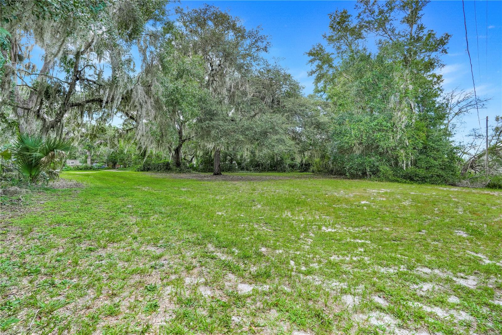 Ready to Build Your Dream Home or Investment Property in the heart of Lakefront City? This gorgeous property in Leesburg offers that
opportunity and more. There are nearly 2 acres which have plenty of Investment Opportunities such as multiple units due to R-6 Zoning. The
neighboring available property would double your footprint in this beautiful part of Central Florida. Power is available and there is no HOA. This
property is near enough for all your shopping and entertainment needs while far enough to experience all the peace and serenity you thought could only be found in your dreams. Hurry now or at this price it will be gone before you know it!