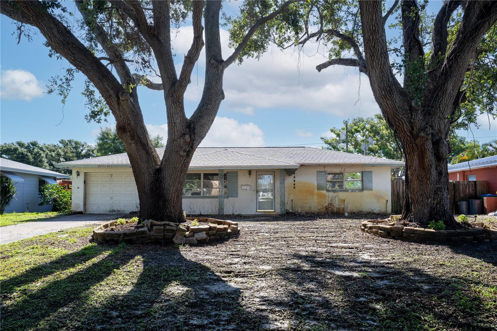 Investor special in a prime Seminole location! This 2 bedroom, 1 bathroom, 1 car garage single-family home sits in an A+ school zone and offers strong potential with comps over $400K once renovated. With a solid roof from 2019 and a reliable AC system already in place, the big-ticket items are covered—leaving you to focus on windows, cosmetic updates, and adding your personal touch. Nestled in a non-flood zone and just minutes from parks, downtown St. Pete, beaches, shopping, dining, and entertainment, this is a fantastic opportunity to build equity or add to your portfolio. Don’t miss your chance—schedule your private showing today!