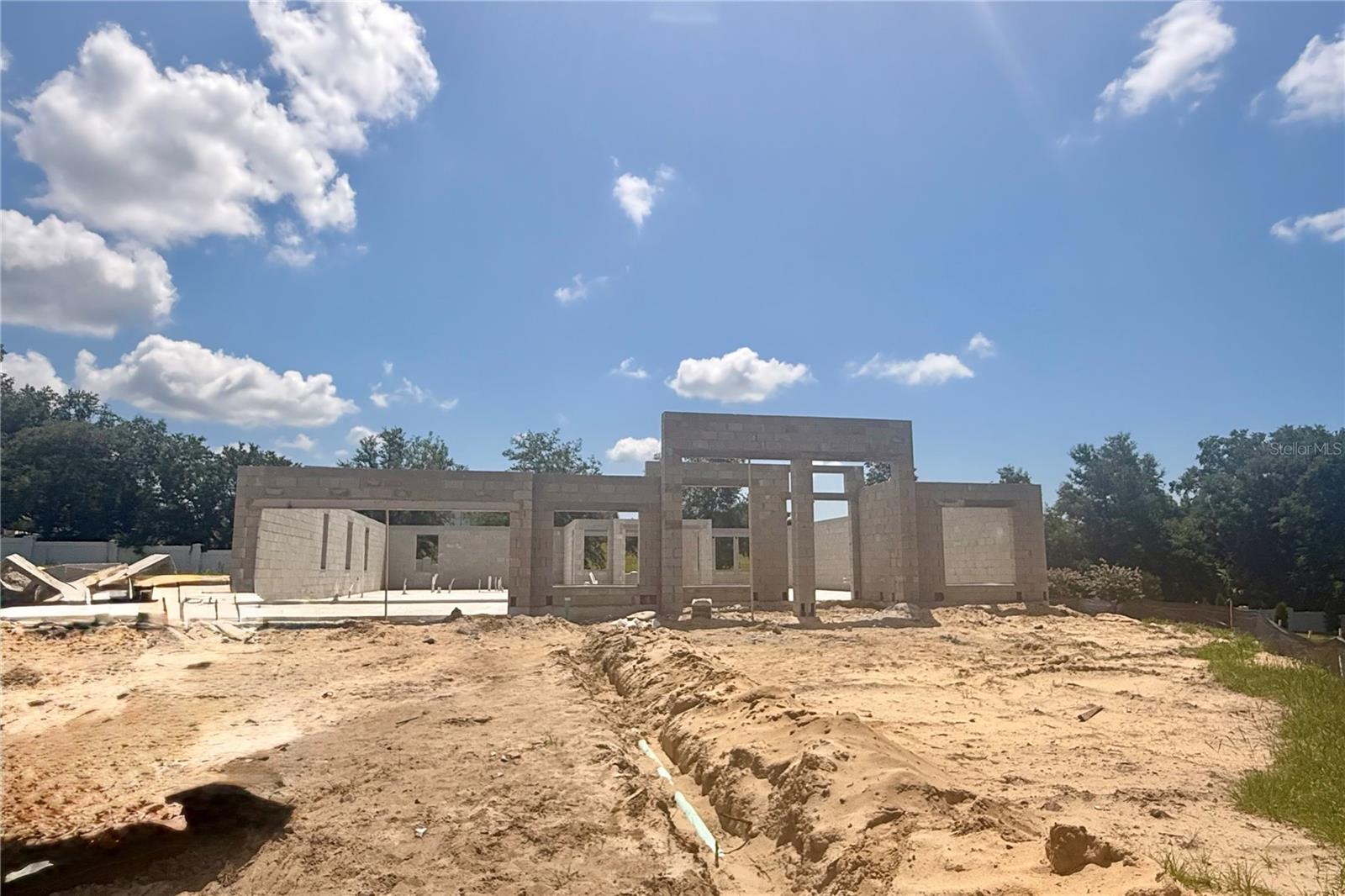Under Construction. Welcome to 3334 Wolf Lake Avenue, a stunning new construction home for sale in Apopka! This spacious home offers 5 bedrooms, 4 bathrooms, an open-concept living space, a first-floor owner's suite, a bonus room, a formal dining room, a 2-car garage with additional storage space, and so much more. This beautiful home combines functionality with elegant design, featuring an inviting open-concept layout that creates a natural flow between living spaces. The first-floor owner's bedroom offers privacy and convenience, while the additional bedrooms provide comfortable accommodations for family members or guests. The thoughtful design of this home incorporates quality materials and attention to detail throughout. Each room has been carefully planned to maximize comfort and usability, with an emphasis on creating spaces that work for today's lifestyle needs. The practical layout ensures that every square foot serves a purpose, creating a home that's as functional as it is beautiful. Don't miss your chance to make this home yours!
