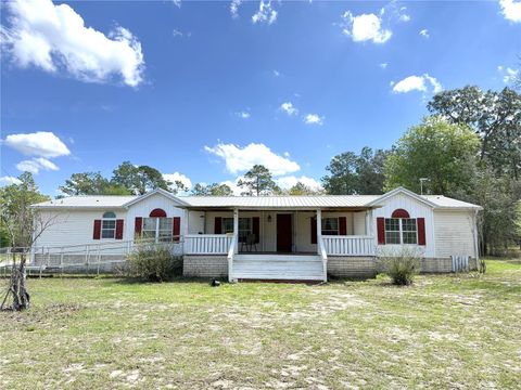 Photo of 2951 SE 134th Terrace, Morriston, FL 32668 (MLS # OM720957)