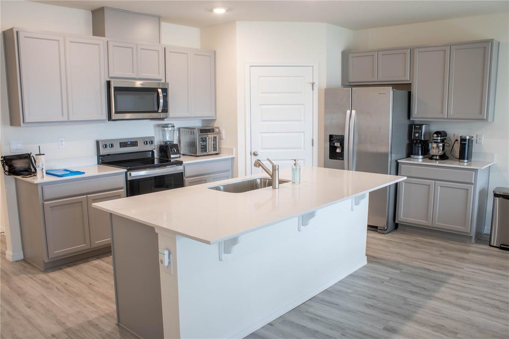 Photo of 5218 Orchard Oriole Loop, Bartow, FL 33830 (MLS # L4965269)