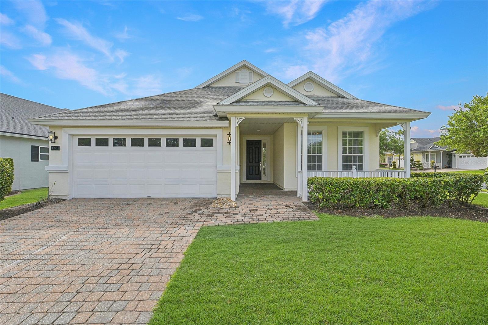 One or more photo(s) has been virtually staged. **PRICE IMPROVEMENT** Beautifully maintained Eagle Trace plan in the desirable 55+ Cascades at World Golf Village, just a short walk to the resort-style clubhouse. Located on a larger-than-average lot with guest parking nearby, this home features vaulted ceilings, a spacious screened lanai, and numerous upgrades completed in March 2025: new AC, garage motor/opener, range, microwave, dishwasher, faucets, toilets, fresh paint, and deep-cleaned carpets. The kitchen offers granite counters and a marble tile accent wall under the breakfast bar. The flexible bonus room/office is ideal for work or guests. HOA includes lawn care (mowing, trimming, and irrigations) and access to top-tier amenities: indoor/outdoor pools, fitness center, card rooms, ballroom, libraries, arts & crafts studios, and optional golf memberships.
