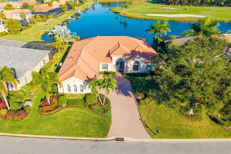 Waterfront Perfection: The Ultimate "Lefe Life" Awaits!  If you demand a breathtaking view, a brand-new roof, a pristine pool deck, and your own private composite dock with an 8000lb lift, you’ve found your sanctuary in the gated Waterlefe Golf and River Club.
Live worry-free with zero issues: a brand-new roof ensures peace of mind from day one. The view is truly spectacular—you must see it in person. The newly resurfaced pool and sprawling travertine deck, framed by an expansive aquarium window cage and outdoor kitchen, define Florida living at its best.
Step down to your private dock (have your poles ready as the pond features world-class bass fishing!) and cruise the Manatee River to many waterfront restaurants and more.
Inside, the updates shine: quartz counters in the kitchen and primary bath, newly painted cabinets with chic brushed gold hardware, and a true exhaust hood over the range. The zen-like primary suite features copper sinks, frameless glass, and an extended primary bedroom closet with natural light.
This open-concept, entertainer’s dream floor plan flows from space to space, offering split bedrooms and a massive 3-car garage. The windows and lanai provide Protection with hurricane shutters for summer storms.
Waterlefe is more than a home; it's a destination. The renovated River Club serves up resort amenities including a restaurant, fitness center, Tiki bar, and Junior Olympic pool. Embrace the #lefelife with daily activities and optional golf or marina access.  Taxes include the CDD.