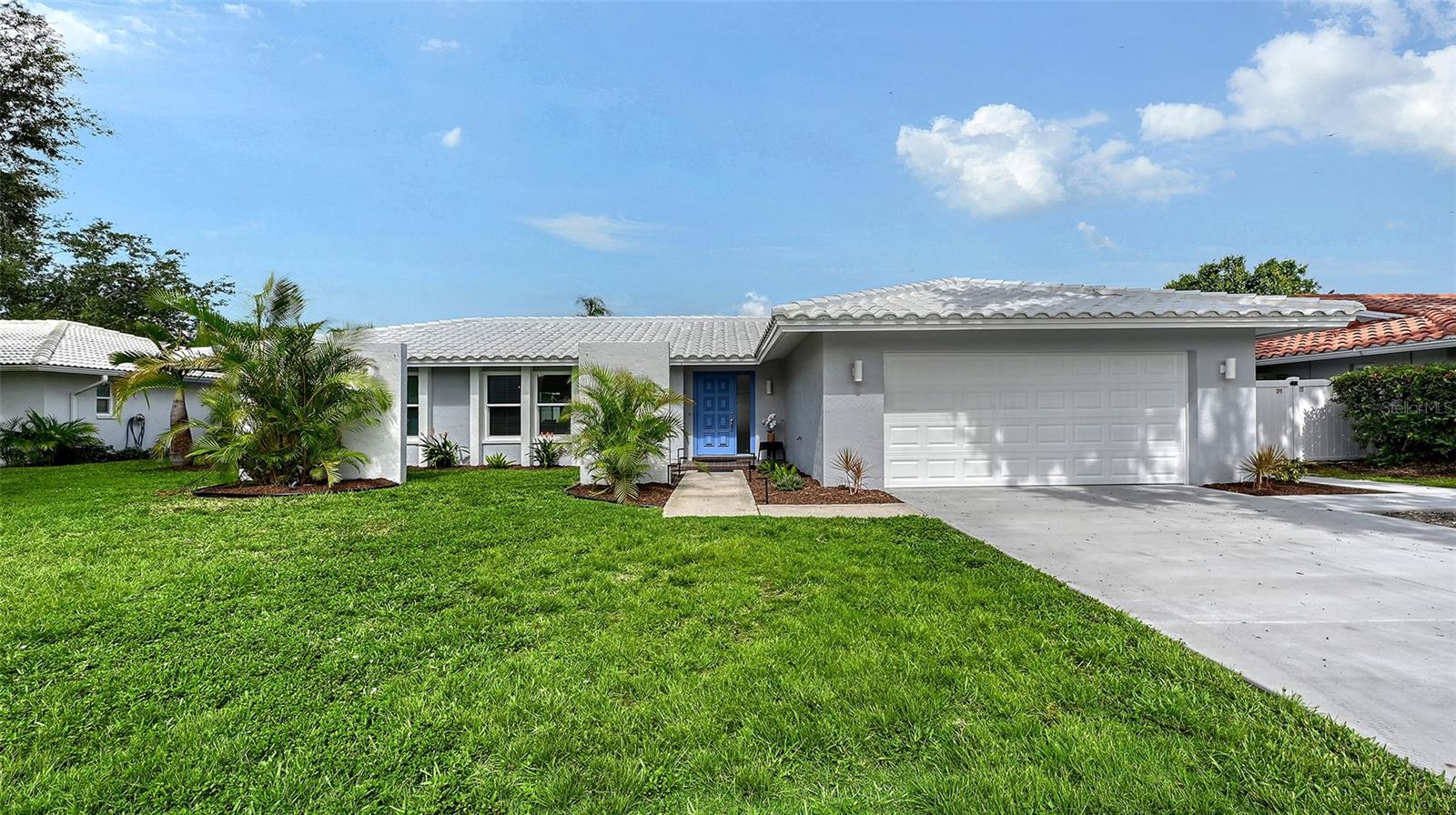 BEAUTIFULLY UPDATED AND MOVE-IN READY GULF GATE POOL HOME WITH BRAND-NEW TILE ROOF! 2025 UPDATES ALSO INCLUDE CARPET, BATHS, EXTERIOR AND INTERIOR PAINT, DRIVEWAY, FENCE, LANDSCAPING AND MORE! Located in the sought-after Gulf Gate Woods community, this beautifully refreshed 3-bedroom, 2 full bathroom residence blends timeless design with modern upgrades, all nestled just minutes from world-renowned Siesta Key Beach. Step inside to discover a spacious and inviting layout ideal for both everyday living and entertaining. The bright and spacious living room welcomes you with natural light and new neutral tone plush carpet. The open-concept kitchen features a just completed raised ceiling with recessed lighting and additional 2017 improvements including stainless steel appliances, soft close cabinetry, and granite countertop, and flows seamlessly into a generous breakfast room and separate dining room too! The thoughtful split-bedroom floor plan ensures privacy, with the primary suite positioned separately from the guest bedrooms. The primary bedroom is a true retreat, featuring a renovated en-suite bath with a sleek subway tile shower enclosure, on-trend black fixtures, new floating vanity and modern finishes. Two additional bedrooms are located on the opposite wing and share an updated full bath with a granite topped vanity. The additional 24x10 bonus room is a great space for entertaining or relaxation, with windows out to your own private oasis which includes the sparkling heated pool and screened lanai. A 2023 water heater ensures energy efficiency, while the spacious interior laundry room adds everyday convenience. The prior owner replumbed the home with PVC pipes. The attached two-car garage includes abundant cabinetry, ideal for storage and organization. This home is in the X flood zone and is high and dry. Gulf Gate Woods is a well-established neighborhood known for its sidewalks, streetlights, and friendly sense of community. Zoned for A-rated schools, this prime Sarasota location places you within 10 minutes of Siesta Key Beach, downtown Sarasota, the Legacy Trail, golf courses, fitness centers, Sarasota Memorial Hospital, fine dining, UTC and the charming shops and restaurants of Gulf Gate Village. Whether you're seeking a full-time residence, seasonal getaway, or a smart investment, this home offers flexibility and would also make an excellent option for a long or short-term rental. This is a rare opportunity to own a tastefully updated pool home in one of Sarasota’s most desirable neighborhoods. Schedule your private showing today.
