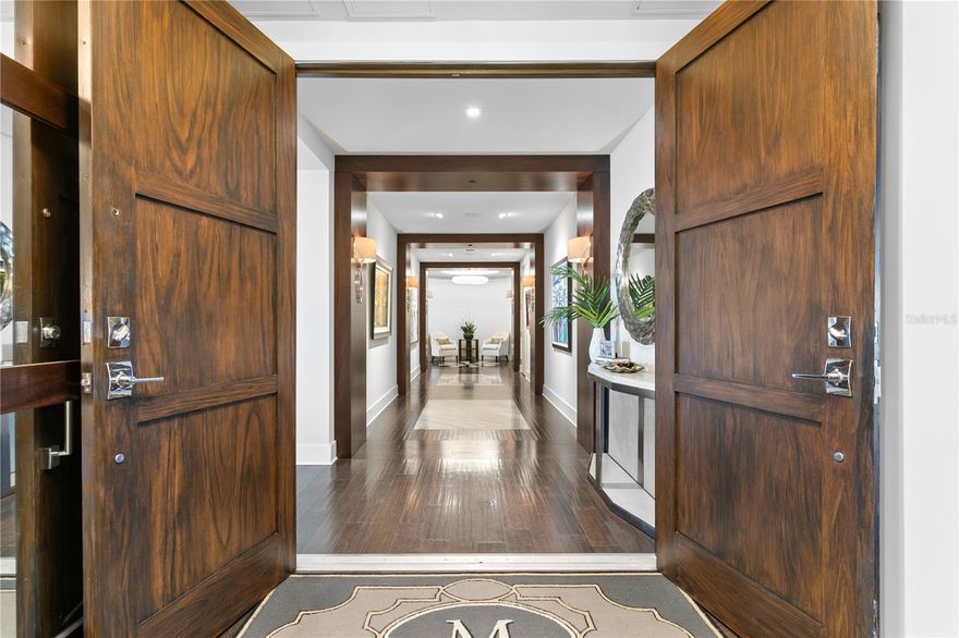 PRICE IMPROVEMENT & RARE 2.75% ASSUMABLE MORTGAGE. There are residences, and then there are private sanctuaries in the sky—homes so rarely available they become part of a city’s legacy. Now offered at a compelling new value, this full-floor penthouse at Rowland Place is a singular offering of scale, light, and absolute privacy. Spanning over 7,450 sq. ft. of uninterrupted living space with no shared walls, this is estate living lifted above the city.

Arrive by private elevator to a grand salon designed as a private gallery, a chef’s kitchen anchored by Wolf and Sub-Zero, and a temperature-controlled wine room. Designed for a life of flex and retreat, the floor plan features dual private offices, a theater-style media area, and a game lounge with a full bar. The primary suite lives as a residence within a home, boasting dual spa-inspired baths, boutique dressing rooms, and a wrap-around sitting room. Four additional guest suites ensure every arrival is indulgent.

Reinforcing its rarity, the home includes two private two-car garages (4 total spaces) with EV charging. Beyond the walls, St. Petersburg is your walkable playground—steps from Beach Drive, the St. Pete Pier, and The Dali. With a unique assumable 2.75% interest rate mortgage (approx. $3.6M balance) and a well-managed building with fully funded reserves, this is an irreplaceable financial and lifestyle asset. A true legacy property in the heart of downtown.