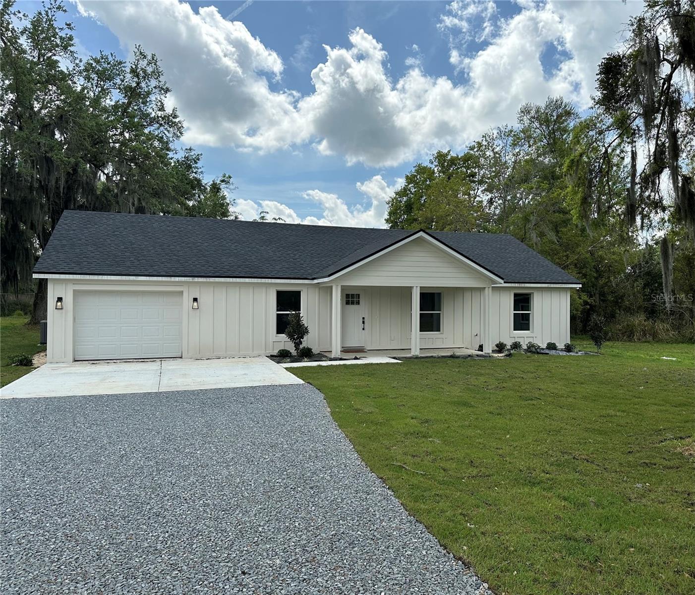 Custom-built in 2024, this 3-bedroom, 2-bath home is perfectly located at the end of a dead-end road in North Lakeland. The spacious lot provides privacy while still being close to everything. Inside, you’ll find an open floor plan with durable hard-surface flooring throughout, a modern kitchen with stone countertops, stainless steel appliances, and bright living areas that feel welcoming and functional. The split-bedroom layout offers privacy with generously sized rooms. Outside, enjoy a covered back porch, large yard, storage shed, and 1-car garage. Conveniently off Kathleen Road, this home is minutes from Publix, I-4, shopping, dining, schools, parks, churches and Bonnet Springs Park.