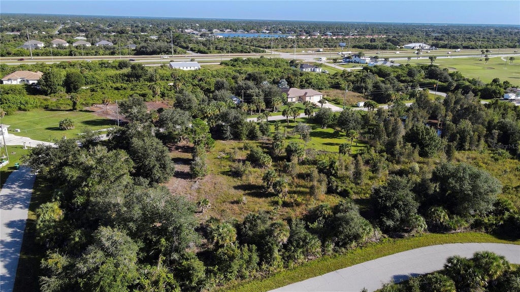 Photo of 7022 Landrum Circle, Port Charlotte, FL 33981 (MLS # A4710428)