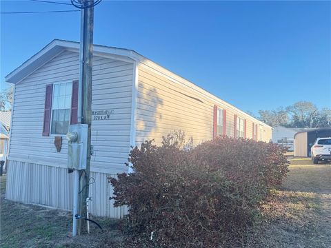 Photo of 320 E 8th Street, Frostproof, FL 33843 (MLS # K4903311)