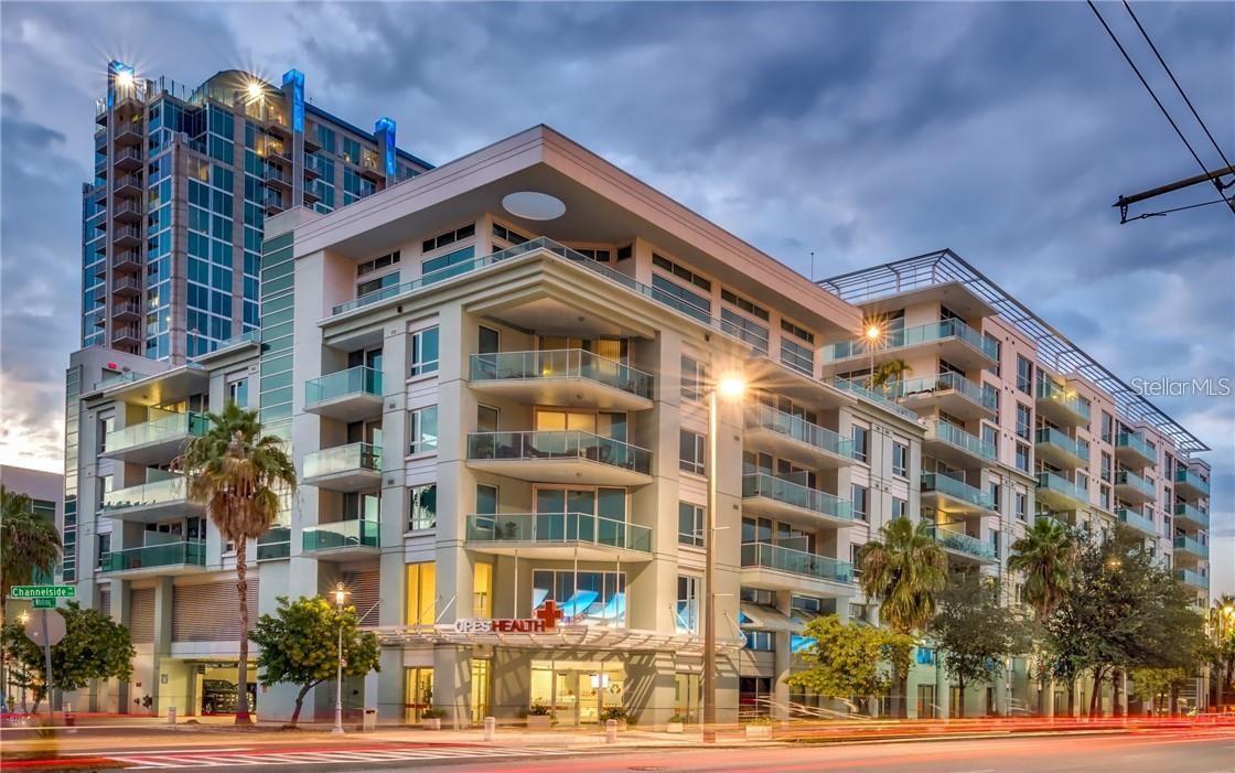 Welcome to the Channel District and Welcome Home! This lovely property overlooks the beautiful pool & recreation area! Enjoy all the amenities The Place has to offer: Pool, Spa, Sauna, Meditation Zen area, full service gym, clubhouse with pool table, outdoor grill area, secure parking, beautiful landscaping, security. Walking distance to wonderful restaurants, shopping, Sparkman Wharf, dogs parks, Riverwalk and home of our Stanley Cup Winners the Lightning! Condo features new flooring in bedrooms and is recently painted as well as newer fixtures! Enjoy the convenience of a walk in laundry room! Master bedroom boasts very large walk in closet! Master bath has separate walk in newly tiled shower! Faux fireplace adds charm to the beautiful kitchen that has stainless steel appliances. All rooms generously sized with plenty of closet space! Natural light pours in through floor to ceiling slider! New water heater. Serene balcony with beautiful views of pool and Tampa along with our beautiful big blue sky. Eight floor condos at The Place has fantastic higher ceilings! City living at it's finest! Walking distance to it all! Come enjoy Tampa, a big little city!