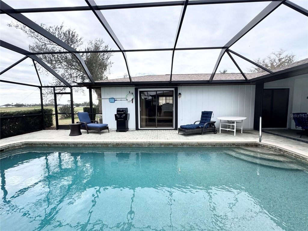 Photo of 290 Rotonda Circle, Rotonda West, FL 33947 (MLS # D6140781)