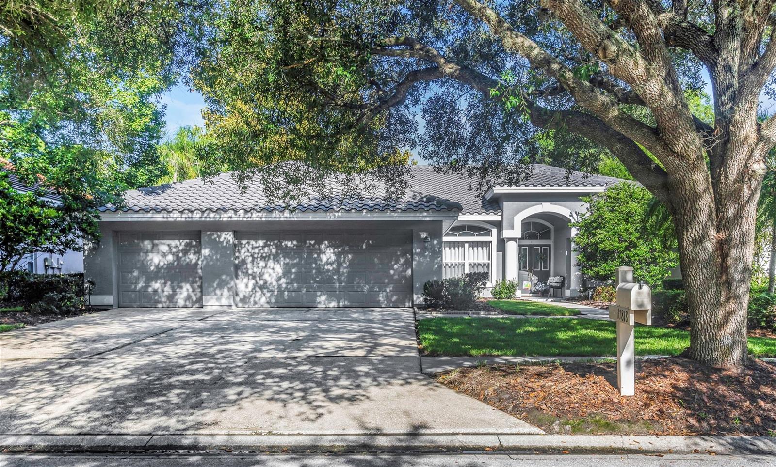 Welcome to this bright and inviting 5-bedroom, 3-bath, and 3-car garage home set on a quiet cul-de-sac street within the exclusive double-gated community of Hunters Green. Freshly painted, well-maintained, and lovingly cared for, this home is ready to be passed on to its next proud homeowner. Soaring ceilings, abundant windows, and an open layout fill the space with natural light and a warm, welcoming ambiance. The spacious kitchen overlooks the living room and offers an island, breakfast nook, and ample counter space for the home chef. Step outside to an oversized screened pool and large covered lanai with serene conservation and golf course views, offering both beauty and privacy. Hunter's Green provides resort-style amenities including a championship golf course, country club, playgrounds, tennis courts, picnic areas, and miles of sidewalks perfect for walking, jogging, or biking. This peaceful, safe neighborhood blends long-term residents with young families, and offers quick access to I-75, shopping, dining, and downtown Tampa, close to Pinellas beaches and about 50 miles to Orlando's theme parks. American Home Shield Home Warranty is offered to the new homeowners!
