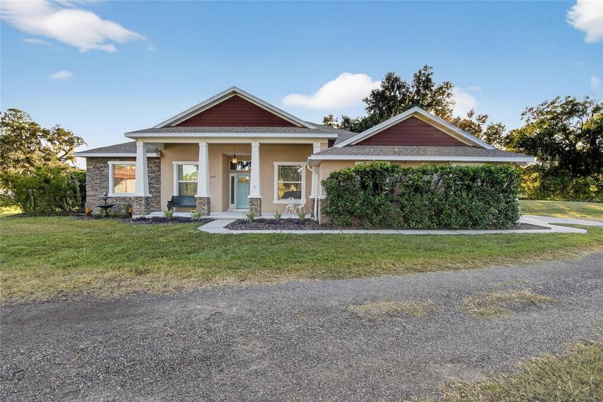 Nestled on nearly 1.5 acres at 4717 Sleepy Hollow Lane in Plant City, this modern craftsman estate by Radd Homes offers peaceful country living with no HOA or deed restrictions—perfect for those seeking space, privacy, and flexibility, all while being just minutes from major roadways with quick access to Tampa, Zephyrhills, and Lakeland. The main home features 3 bedrooms and 2 baths, along with a den/office and a versatile flex space in the primary suite, plus a side-loading 2-car garage. Its stunning kitchen with marble floors, a massive island, and an open flow to the great room with a custom fireplace makes daily living and entertaining effortless. A separate in-law apartment attached to the barn/workshop provides an additional 1 bedroom and 1 bath with its own living room, kitchen, and walk-in closet—ideal for guests, extended family, or rental potential. The oversized barn includes an enclosed office and four roll-up bay doors perfect for hobbies, storage, or housing classic cars, while the expansive property offers ample room to park an RV or boat. Outdoor living shines with a sparkling pavered pool, a covered built-in bar for entertaining, and a cozy firepit area, creating a private retreat designed for comfort, convenience, and the freedom to live as you wish. Call today for your personal tour.