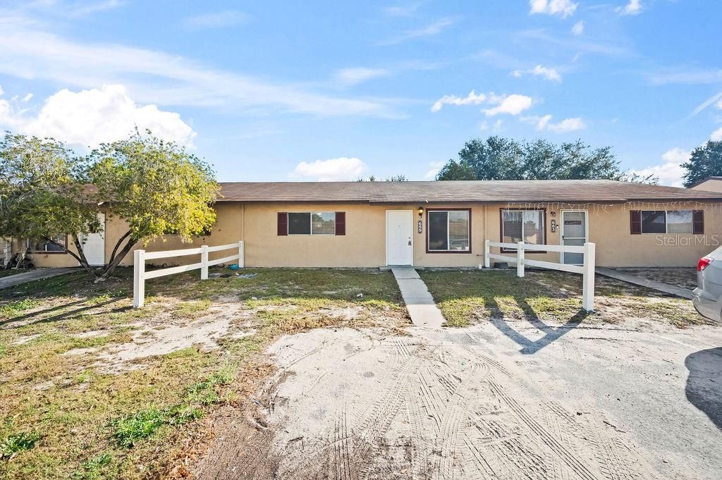 Photo of 655 E Rosewood Lane, Tavares, FL 32778 (MLS # O6370748)
