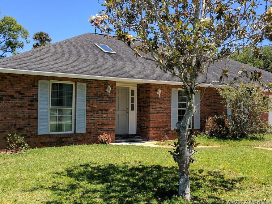 Riverside neighborhood real brick home with charm and LOTS of room to roam! Freshly painted throughout!  Cathedral ceilings, huge lanai, saltwater, solar-heated pool, and real wood burning fireplace to enjoy in this home! Impact/wind-rated windows with inward release for easy cleaning, large fenced yard, Two large guest bedrooms, a double garage with a separate workshop in the backyard, RV hook-up, new granite countertops, cook top, range hood, refrigerator, washer and dryer, solar hot water heater, solar attic fan and MUCH MORE! Home has gas supply if gas appliance are desired. Well sprinkler system. City water and sewer. Pool resurfaced and pavers set in 2013. ;Water: City