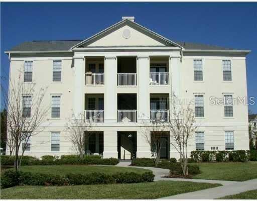 Photo of 235 Goldenrain Drive #303, Celebration, FL 34747 (MLS # S5151618)