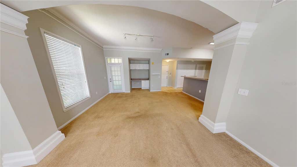 Photo of 235 Goldenrain Drive #303, Celebration, FL 34747 (MLS # S5151618)