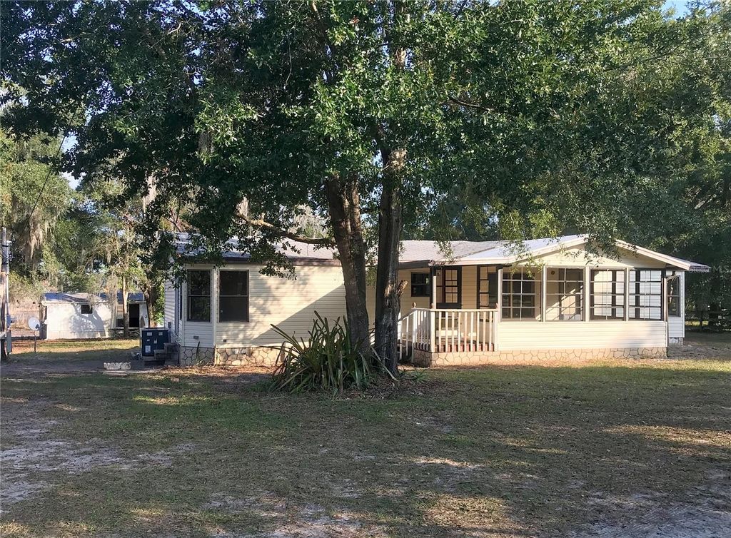 Photo of 11821 SE 123rd Avenue, Ocklawaha, FL 32179 (MLS # OM713918)