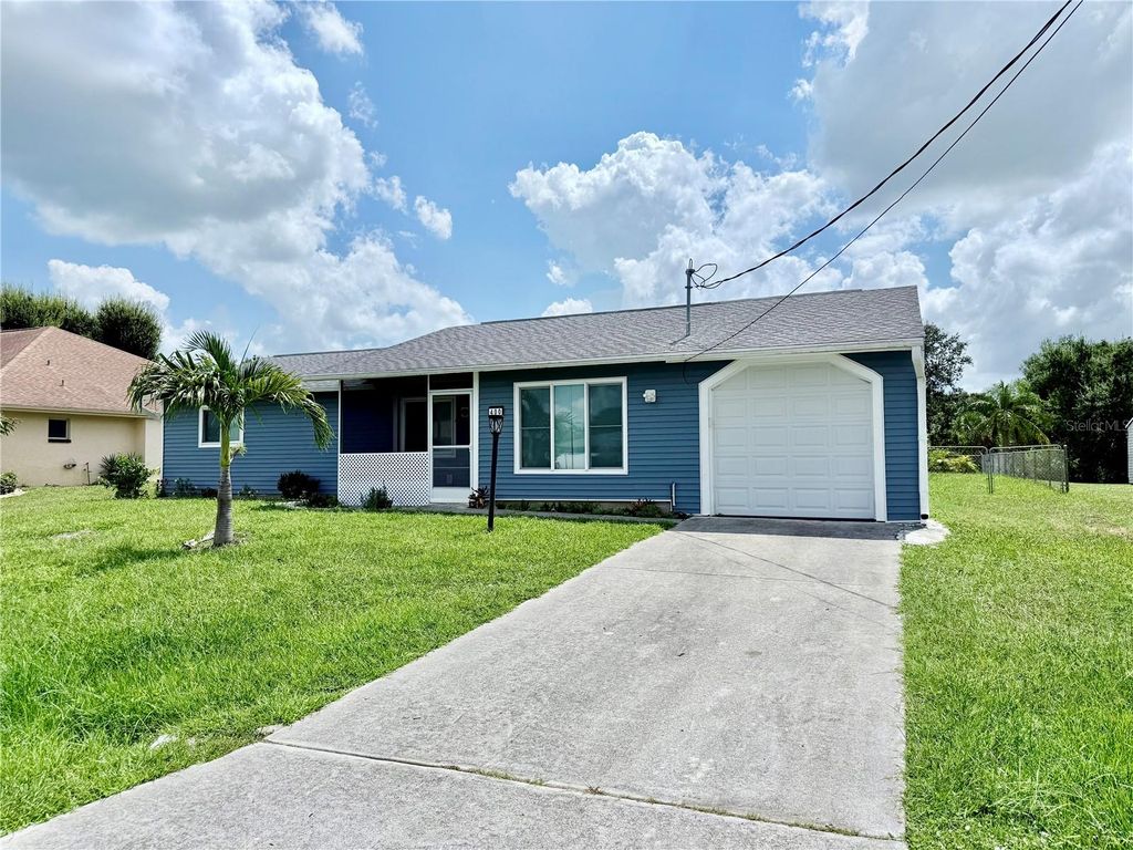Photo of 400 Waterside Street, Port Charlotte, FL 33954 (MLS # C7513186)