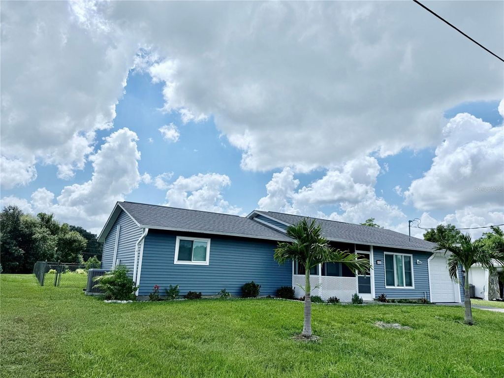 Photo of 400 Waterside Street, Port Charlotte, FL 33954 (MLS # C7513186)