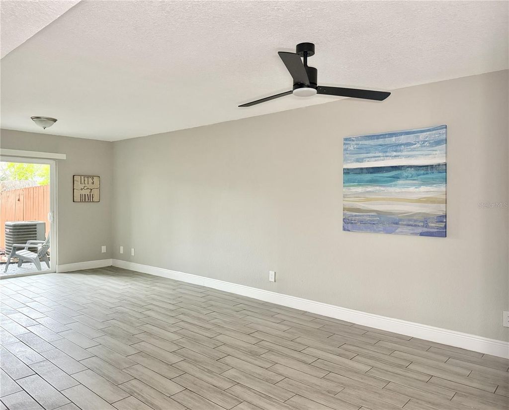 Photo of 5129 Tennis Court Cir, Tampa, FL 33617 (MLS # TB8485922)