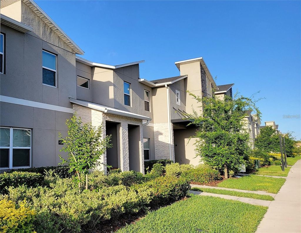 Photo of 456 Ocean Course Avenue, Davenport, FL 33896 (MLS # O6396090)