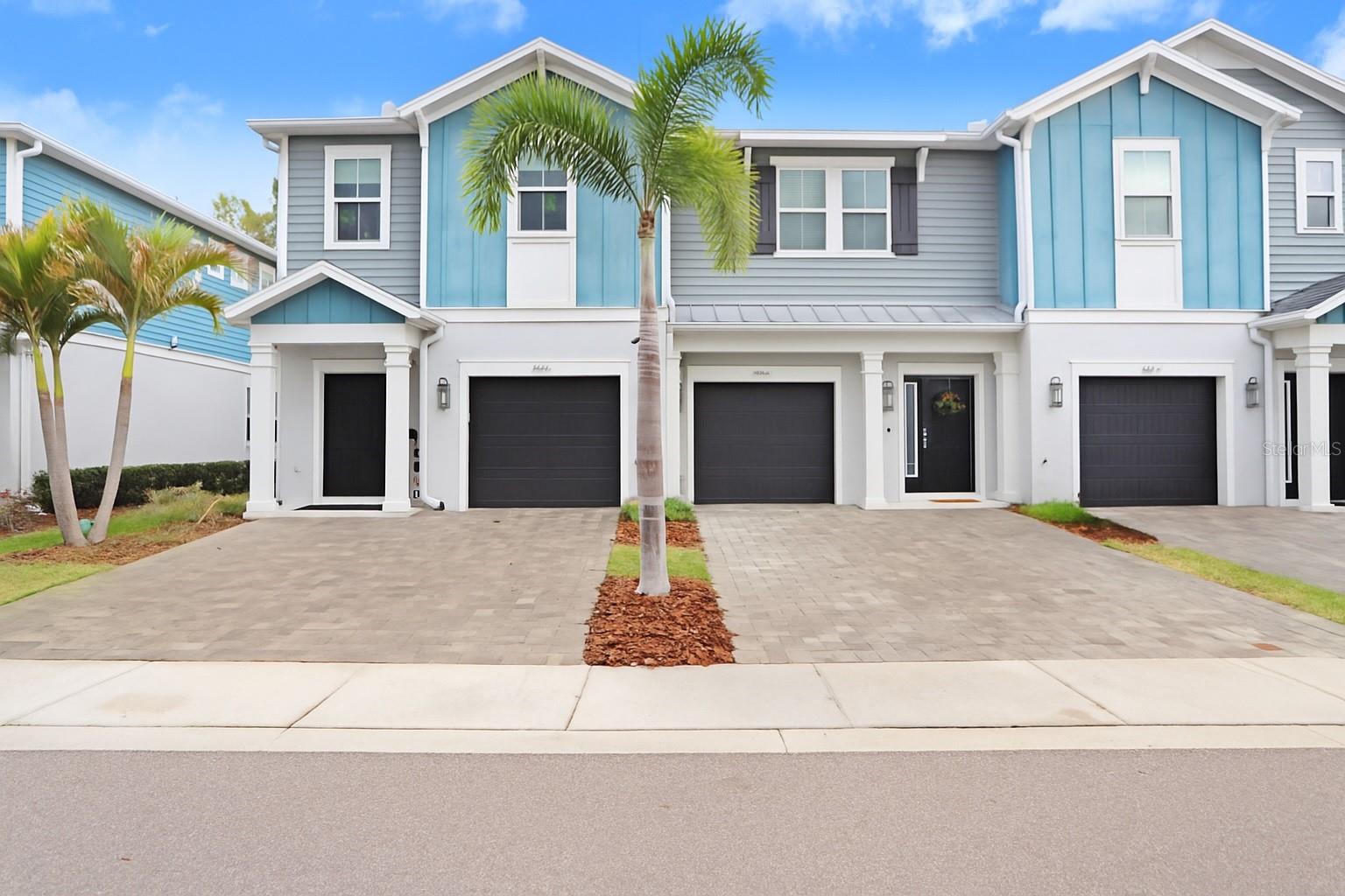 Experience the tranquility of Carrollwood living tucked away in this METICULOUSLY maintained, 2019-built townhome in the highly sought-after, GATED community of Kemerton Place! This stunning 3-bedroom, 2.5-bathroom residence offers the perfect blend of modern comfort + natural beauty, with scenic tree lined views from the FULLY SCREENED LANAI, a true private oasis. Enjoy the residents only COMMUNITY POOL + covered patio, perfect for socializing with family, friends, and neighbors! This beautifully appointed townhome boasts an OPEN CONCEPT first floor, filled with NATURAL LIGHT from large SLIDING GLASS DOORS that lead to the ENCLOSED lanai + a SPACIOUS landscaped common area, great for playing with family + pets. The gourmet kitchen features a large ISLAND, STAINLESS STEEL APPLIANCES, and a spacious WALK IN
PANTRY. The home is fully loaded with PREMIUM features including elegant WOOD-LOOK TILE throughout the first floor + contemporary METAL SPINDLES with a rich OAK WOOD RAILING. Upstairs, a versatile LOFT offers the perfect space for a HOME OFFICE, PLAYROOM, or a BONUS ROOM. Beyond its aesthetic appeal, this home is also built to meet and exceed the latest ENERGY STAR® standards, ensuring energy efficiency and cost savings. Thoughtfully built, the home includes FABRIC SHIELD WIND-STORM PROTECTION PANELS. The property also includes a WATER SOFTENER system. MAINTENANCE FREE LIVING! Lawn care, water bills, + irrigation, are amongst some of the many amenities covered by the HOA. NO CDD! Zoned for HIGHLY COVETED public schools, including Schwarzkopf, Martinez, + Gaither as of HCPS for the 2025-2026 year. Enjoy ACCESSIBILITY, less than 5 minutes to Dale Mabry, schools, parks, playgrounds, shopping, restaurants, retail + more! Just outside the community gates is the renowned North Lakes Park & Sports Complex, a 10.65 acre park, featuring pickleball courts, baseball fields, sand volleyball courts, two racquetball courts, and a playground!