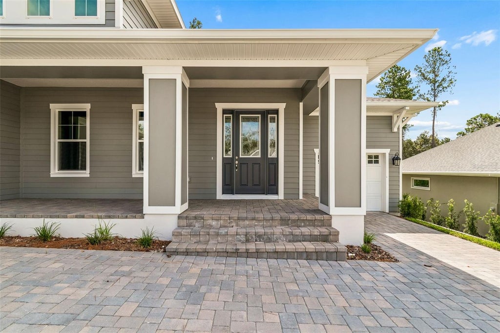 Photo of 4779 Majestic Hills Loop, Brooksville, FL 34601 (MLS # TB8533937)