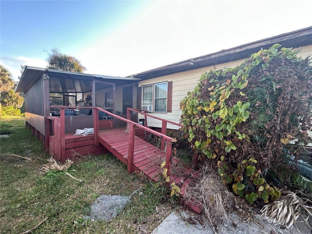 Photo of 217 Gary Avenue, Oak Hill, FL 32759 (MLS # NS1087056)