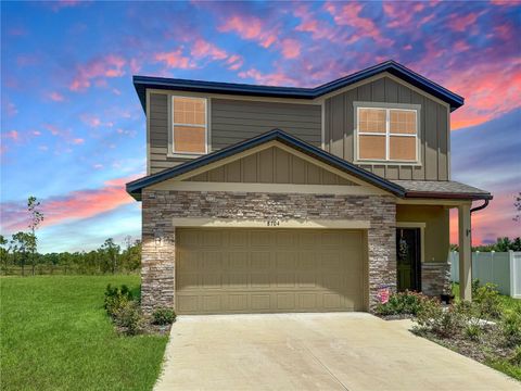 Photo of 8704 Sportsman Loop, Groveland, FL 34736 (MLS # O6338012)