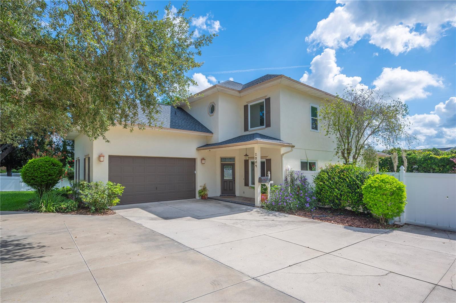 Welcome to this beautiful central Lakeland POOL home, located just half a mile from the picturesque views and recreational trail of Lake Hollingsworth. This 3-bedroom, 2.5-bath residence with an additional flex space offers the perfect combination of charm, comfort, and functionality. Venture inside to find soaring 10ft ceilings on both floors, two spacious living areas with an open and airy flow, and a craftsman-style kitchen that blends character with functionality and timeless design. The living room centers around a cozy gas fireplace, creating a warm focal point for gatherings, while the kitchen features a gas stove for the home chef. Some windows have been replaced and dressed with sleek new roller window treatments, adding both style and energy efficiency. Built in 2002, the home showcases touches of classic architecture such as hardwood floors and elegant pillars, adding warmth and sophistication to the space. Upstairs, the oversized primary suite features a generous bathroom, his-and-hers closets, and a versatile bonus room ideal for a home office, nursery, gym, or creative studio. Two additional bedrooms, including one with a charming roof dormer, share a full bath highlighted by an antique wood vanity and tub-shower combo. Outside, a covered lanai and paver patio lead to a sparkling pool, perfect for relaxing and entertaining. The 0.27-acre lot offers plenty of space to enjoy the outdoors, and the property also includes a two-car garage, a convenient circle driveway, a large outdoor storage closet with built-in shelving on the north side of the home, and a NEW ROOF! Don’t miss the opportunity to make this central Lakeland gem your new home!