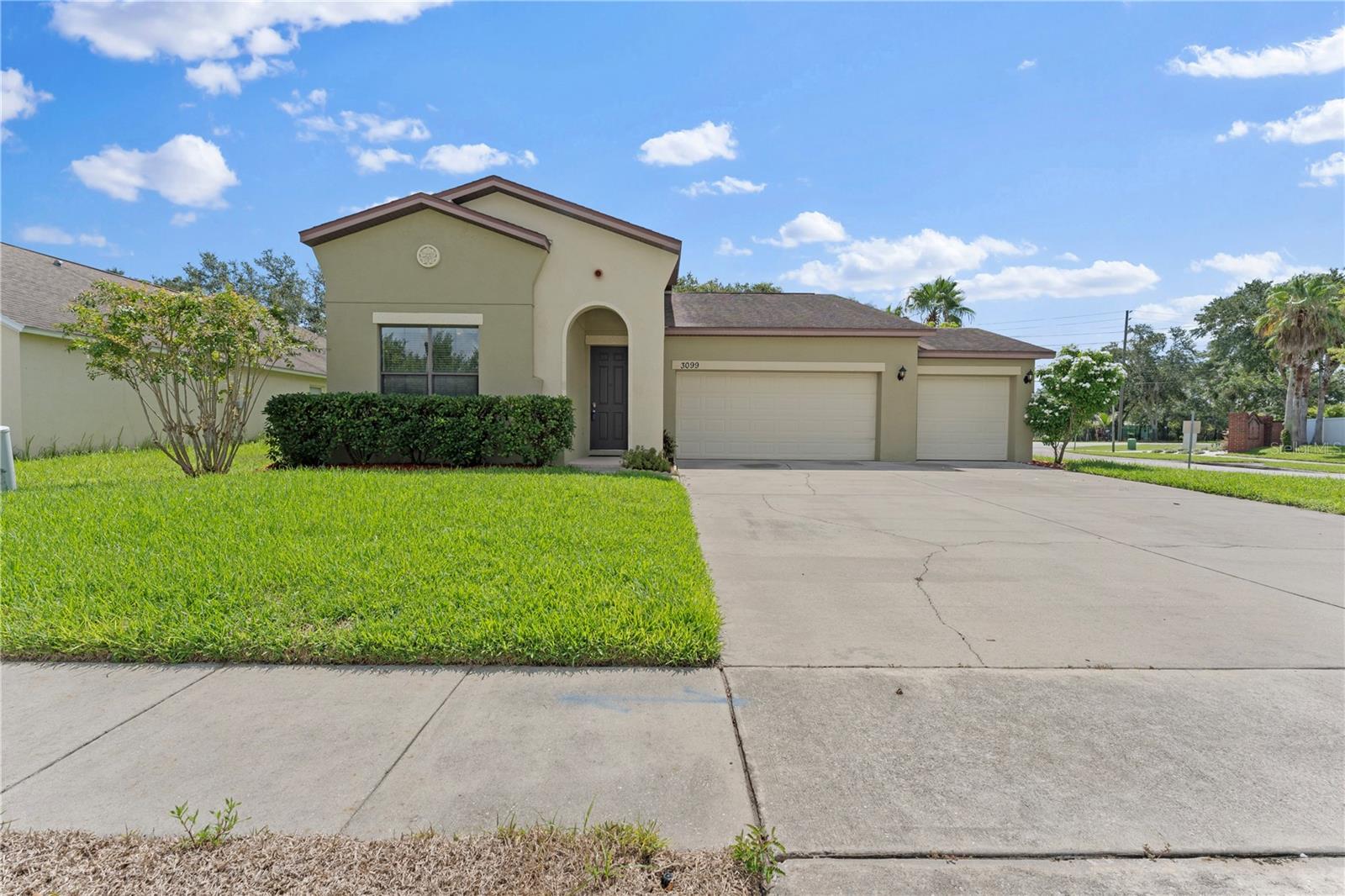This stunning single-family residence, located on a prime corner lot offers abundant natural light, filling every room with beautiful brightness. Freshly painted, this home is move-in ready. With four spacious bedrooms, there's ample room for everyone. The master bath features handicap access, ensuring convenience and inclusivity, while a second well-appointed bathroom adds to the home's functionality. The property also features a three car covered garages and additional parking for three cars in the driveway. You'll have plenty of storage space with the generously sized shed. The community of Doral Pointe includes a community pool, has easy access to schools, parks, shopping, and major commuter routes. Come take a look at this home today!