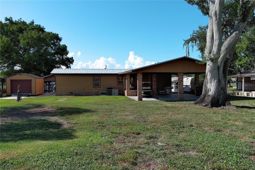 Photo of 2096 Hunter Road, Okeechobee, FL 34974 (MLS # OK225465)