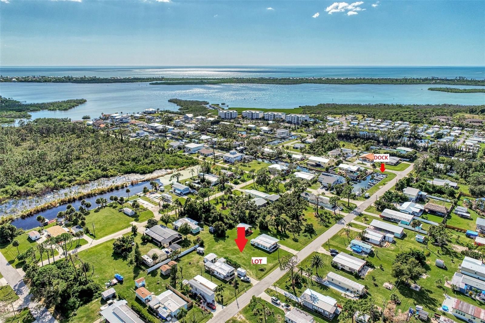 FOR SALE BOAT DOCK LOT AND A 60 X 140 CLEARED LOT AT 8225 ROBERT ST. THE BOAT DOCK LOT IS ON THE CORNER OF ROBERT ST AND 9130 PINE COVE DR. THESE TWO PROPERTIES CAN BE SOLD SEPERATELY. Buyers are you looking for a quiet location where you can put a home on 8225 Robert St, park a boat and then have a dock for that boat. Access to Lemon Bay is approx. 1/3 mile. A leisurely day with your friends or a day of fishing. QUICK ACCESS with no bridges to the ICW and the GULF. The dock walkway is shared with the owner to the west. AccordING to the owner, there is electricity and water available. Contact EWD and FPL for information.
THE 60 X 140 LOT IS , cleared and ready to decide what type of home you want to put on this lot. Please Note: Buyer is to pay title. Boat Basin PID: 412021181003 PRICE: $75000 IF SOLD SEPERATELY. $130K if purchased together. Owner is Motivated.