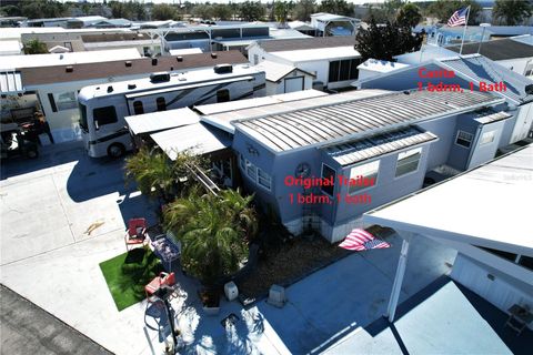 Photo of 411 St George Drive, Davenport, FL 33837 (MLS # O6378793)