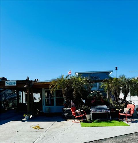 Photo of 411 St George Drive, Davenport, FL 33837 (MLS # O6378793)